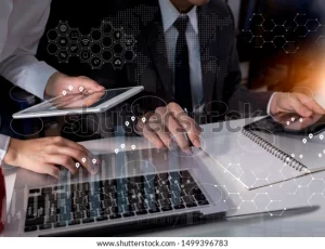 business-teamwork-partners-discussing-documents-600w-1499396783