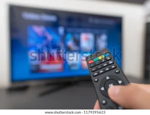 multimedia-streaming-concept-hand-holding-600w-1179395623 (1)